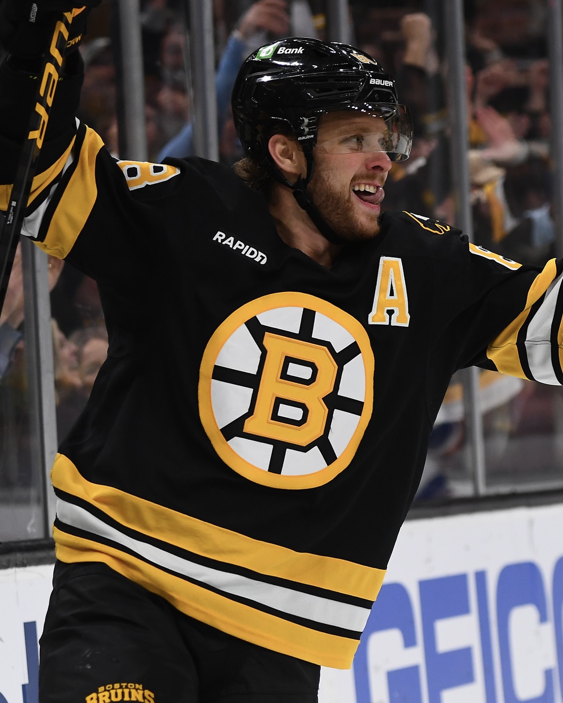 David Pastrňák celebrating the Bruins winning.